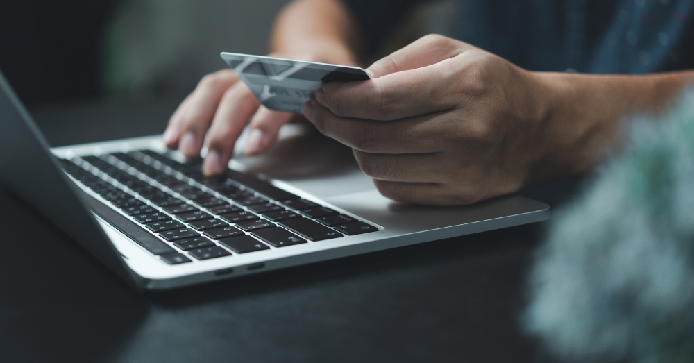 Keycloak scaling for users » Inteca User entering credit card data, illustrating secure login needs in Keycloak scaling