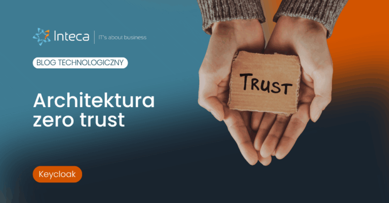 Hero banner for a tech blog: 'Architektura zero trust' with hands holding a card labeled 'Trust' against a blue-orange gradient.